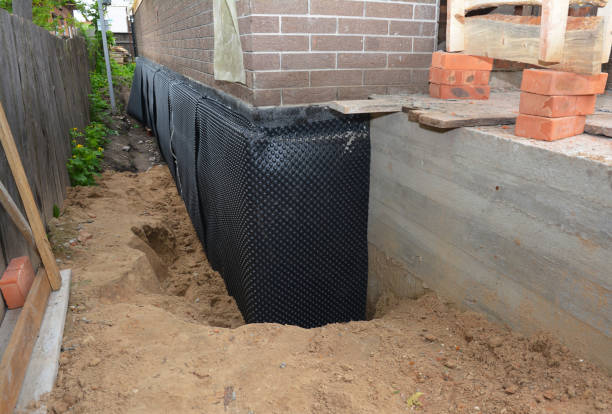 Happy homeowners after waterproofing job in Severn